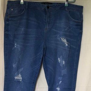 Light Wash Distressed Hem Mid-Rise Skinny Jean